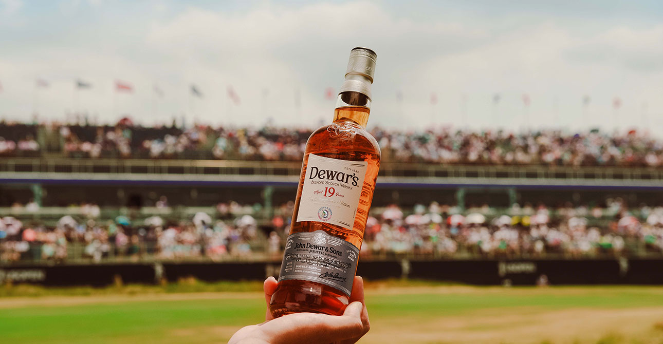 Dewar's U.S. Open 2026 Champion's Edition whisky bottle on display