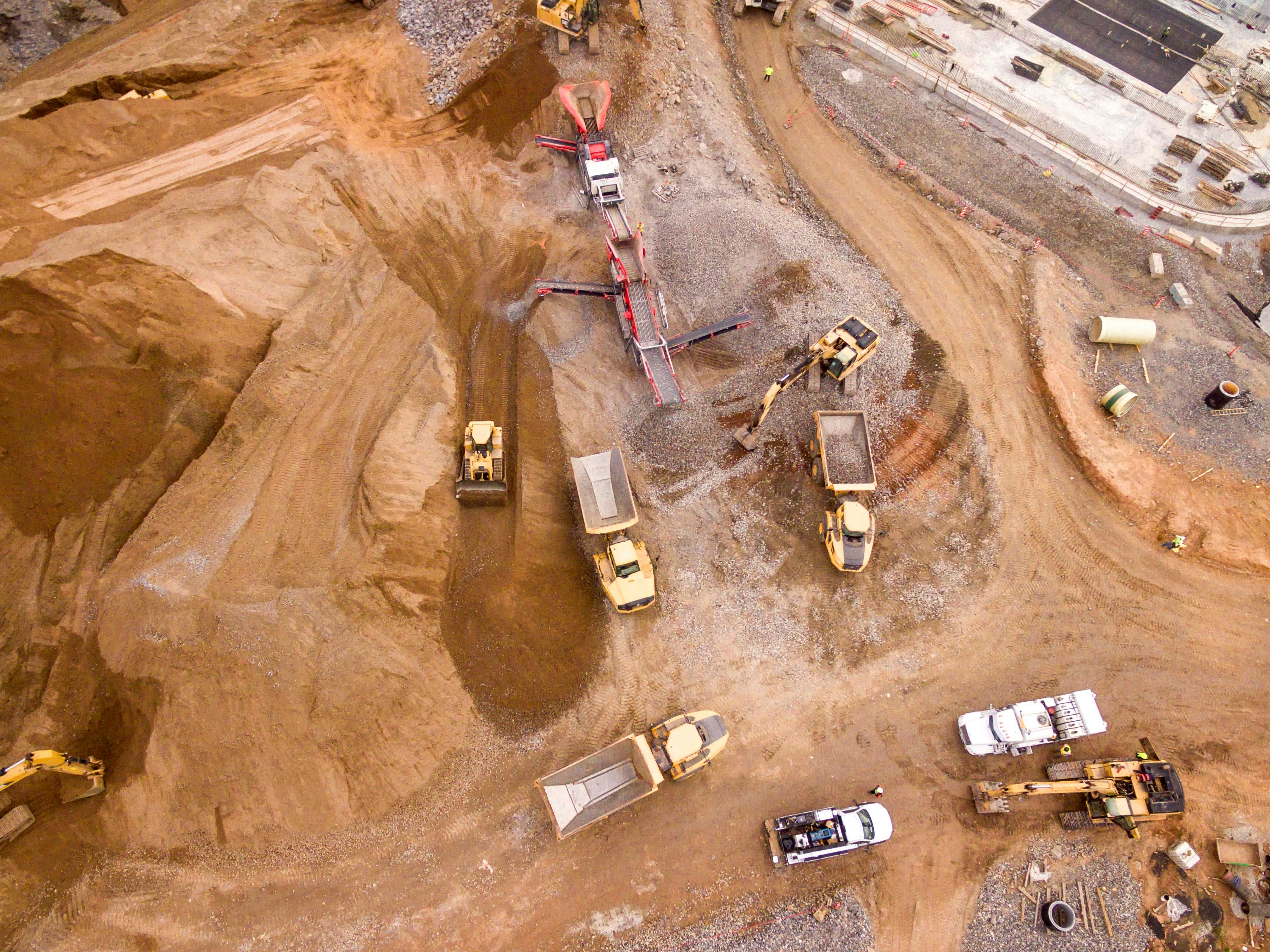 Autonomous construction vehicles at a construction site