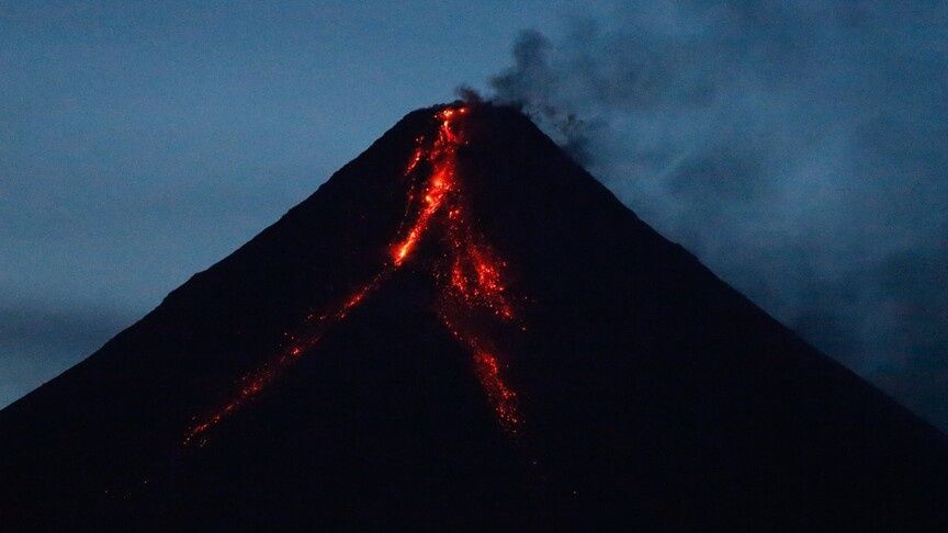 Aerial or observatory view of Mayon Volcano with ongoing seismic unrest