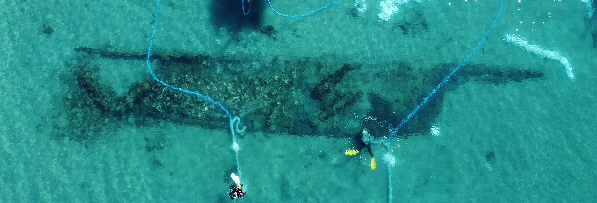 Aerial view of archaeologists investigating the wreck of the Puente Mayorga II, Bay of Gibraltar, Spain