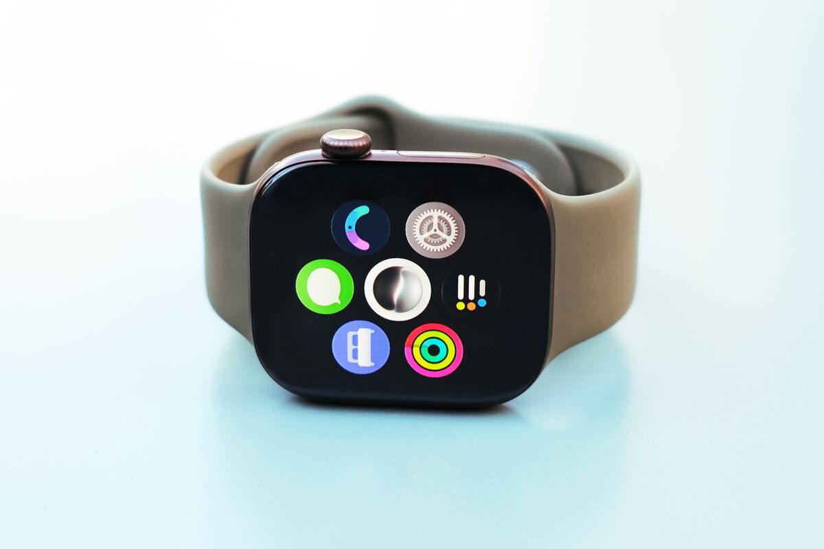 Apple Watch Series 12 alongside dedicated fitness trackers