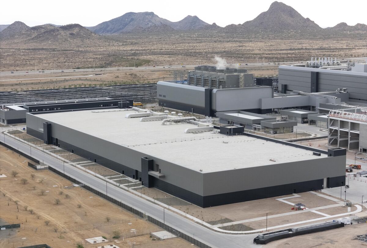 Semiconductor fabrication facility workers and equipment