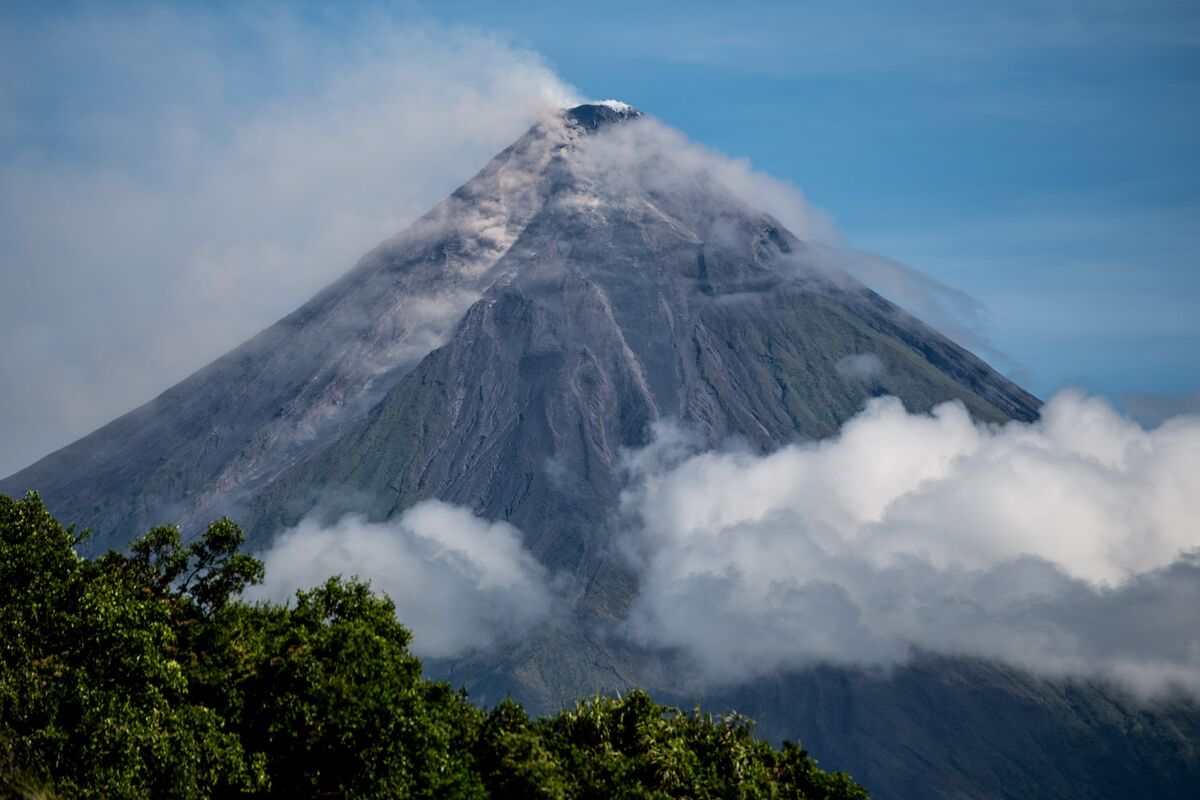 Mayon Volcano eruption aerial view with evacuation underway