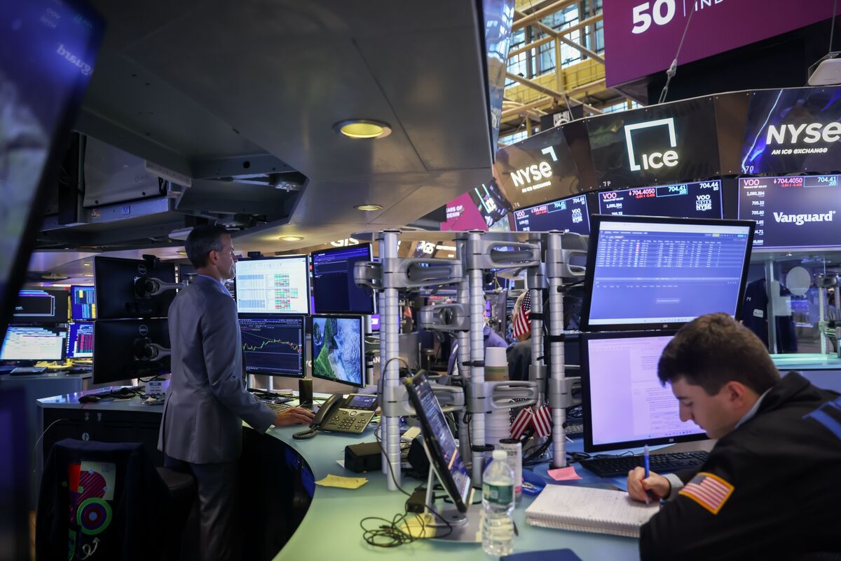 Wall Street building exterior representing market drivers