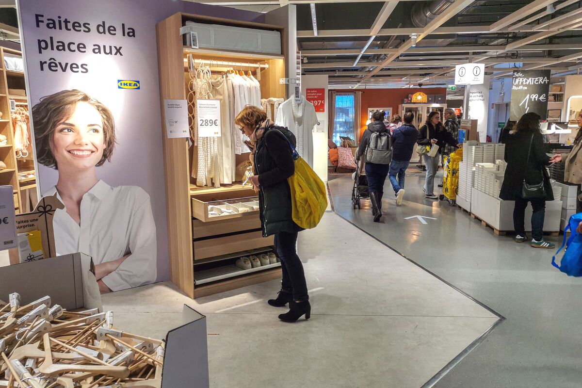 IKEA store exterior showing price reduction signage