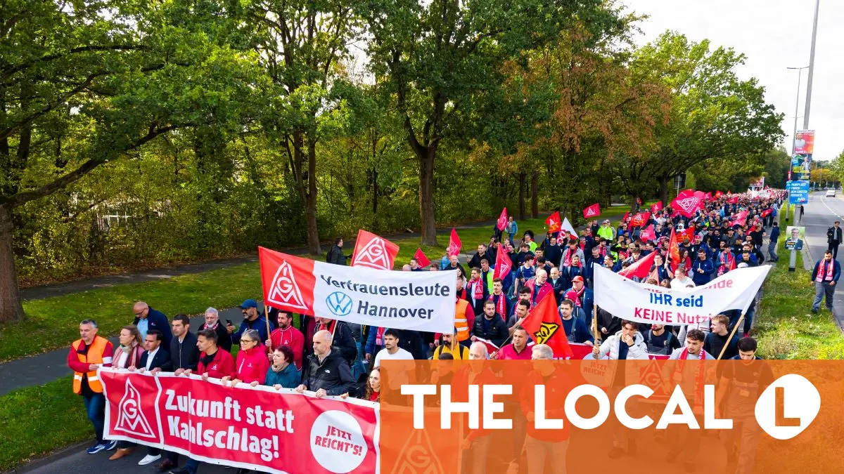 Auto workers protest as German carmakers cut jobs