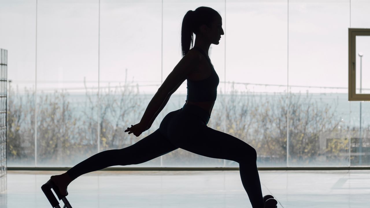 Reformer Pilates machine in a hotel-style fitness studio