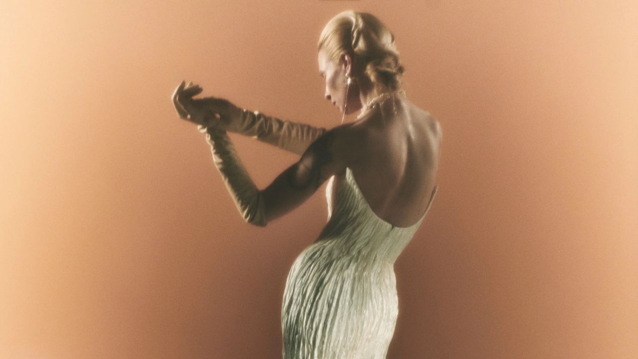 Sleek mermaid-cut wedding gown on runway at New York Bridal Fashion Week 2026