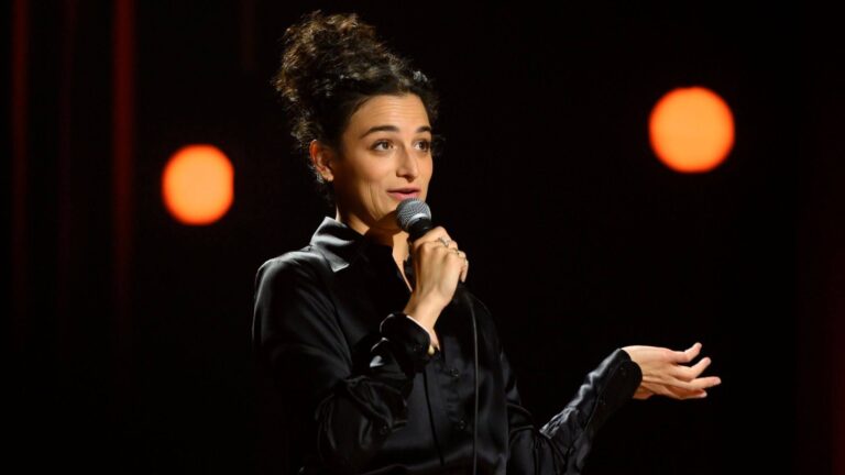 Boston comedian performing on stage