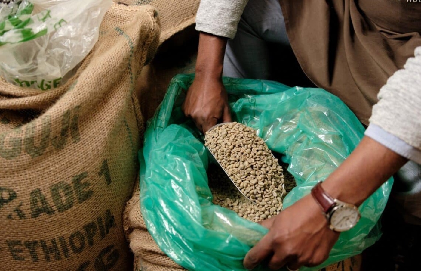 A close-up of roasted coffee beans representing the high-quality Guji coffee lot