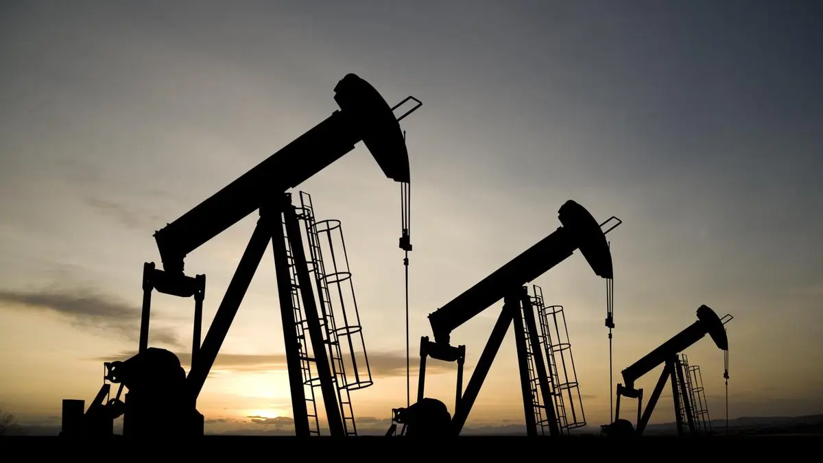 Crude oil drums symbolizing India's fuel price inflation pressure on the economy