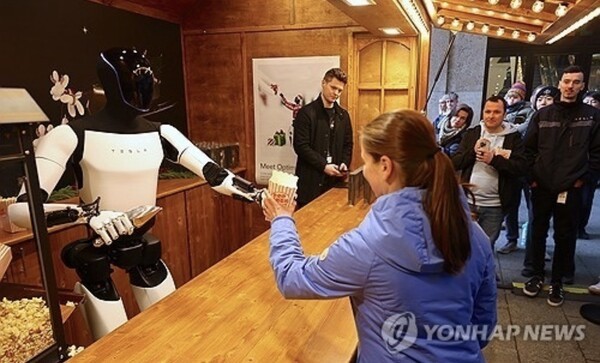 Tesla Optimus related news image