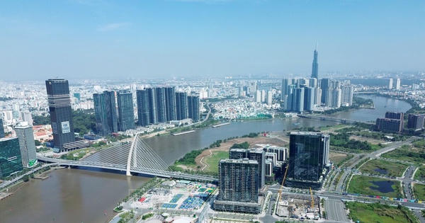 Ho Chi Minh City skyline with construction cranes indicating ongoing development