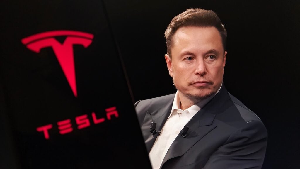 Elon Musk and a Tesla vehicle