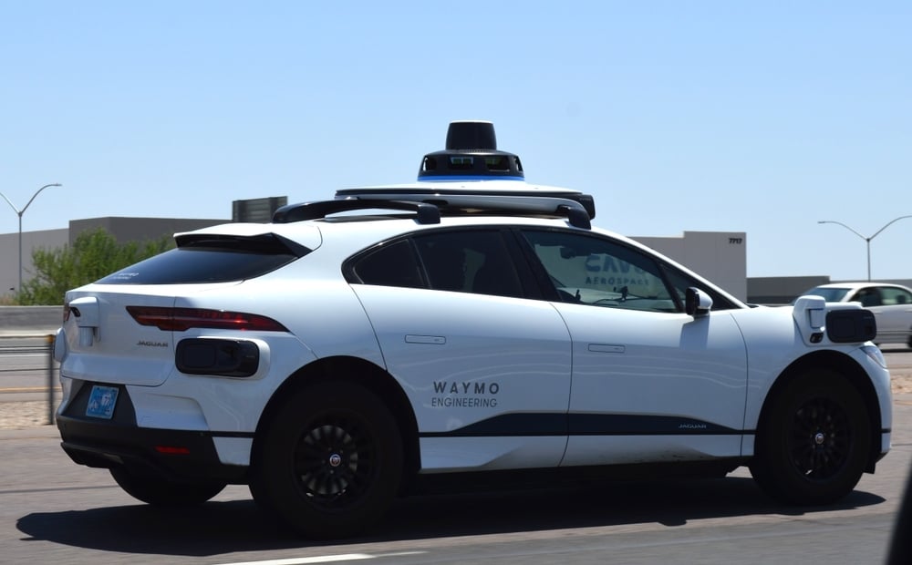 Waymo robotaxis on a street