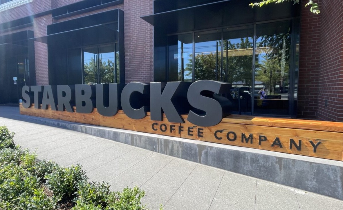 Starbucks storefront — the company is cutting tech jobs as new CTO reshapes the organization