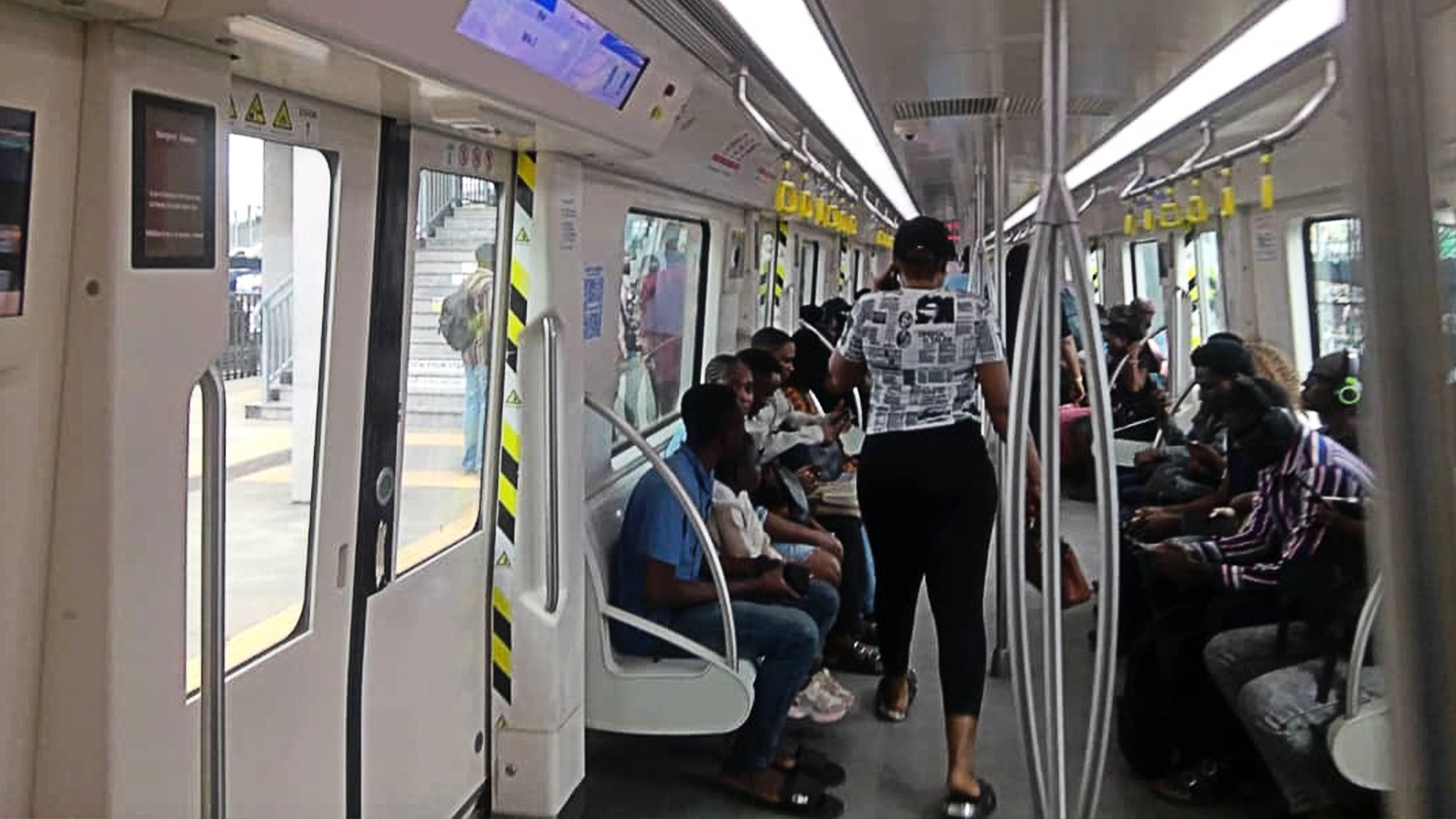 Blue Line passengers at station