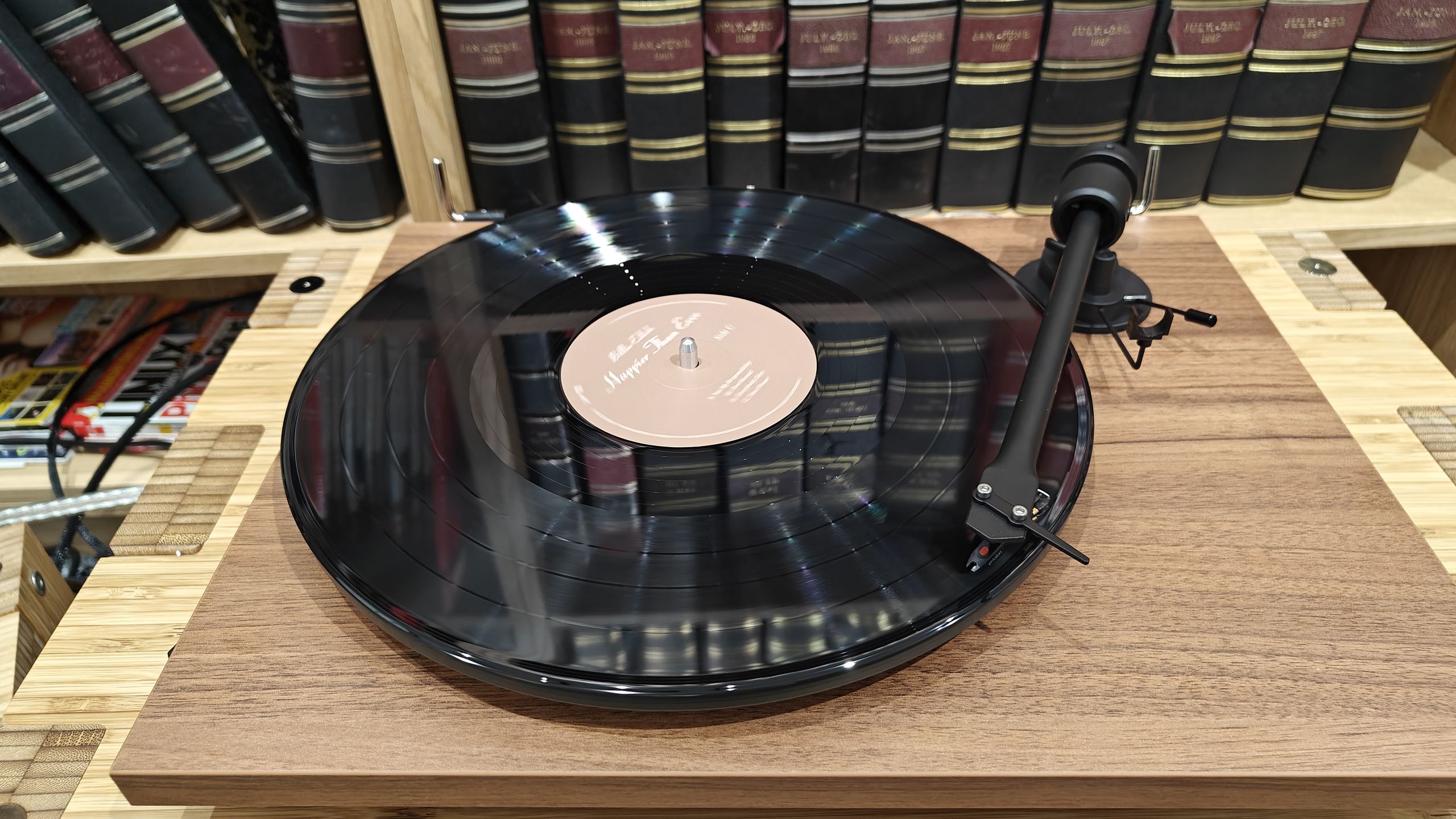Vinyl records on a shelf, illustrating collector culture