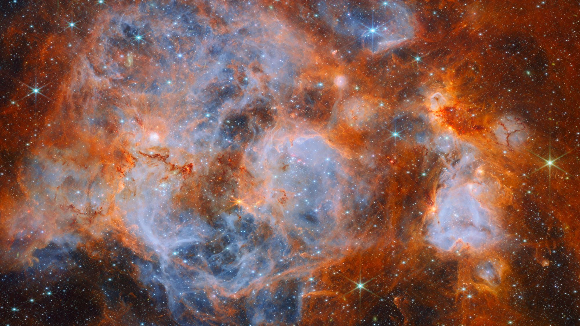 James Webb Space Telescope image of a glowing star-forming region