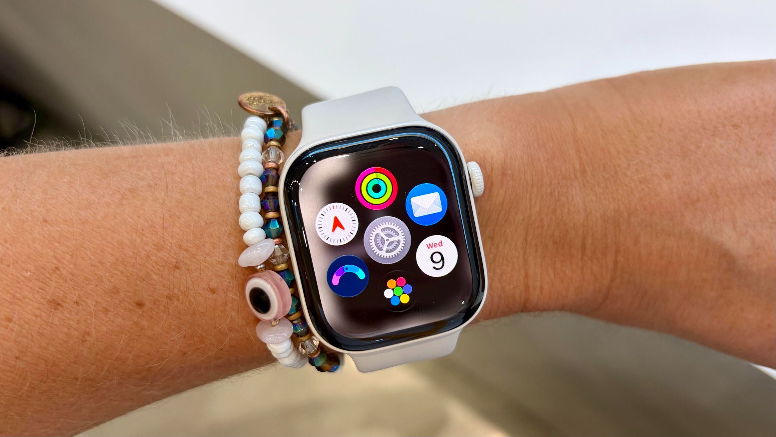 Concept imagery accompanying Tom's Guide coverage of Apple's rumored screenless tracker