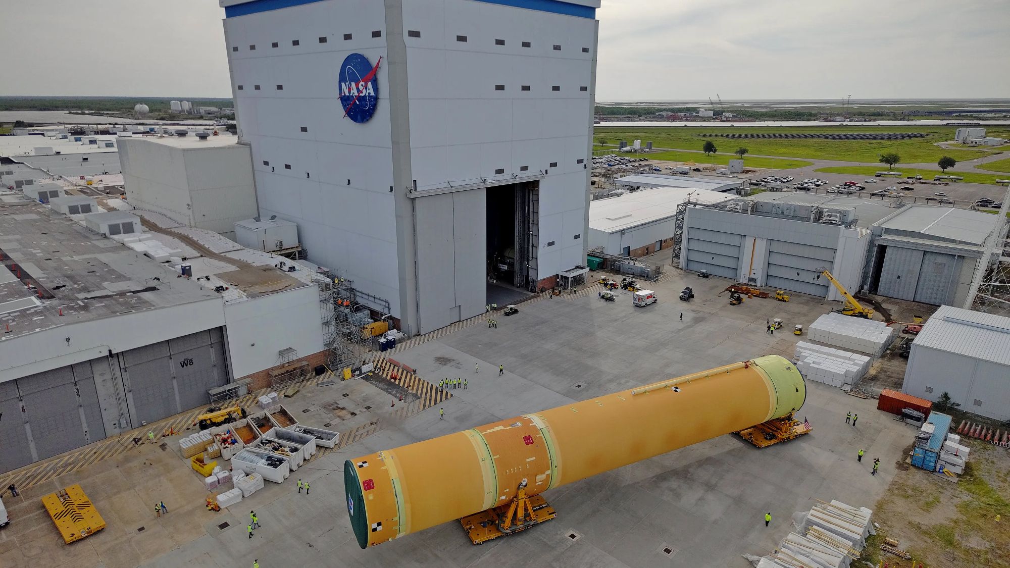 Artemis 3 SLS core stage rollout from Michoud