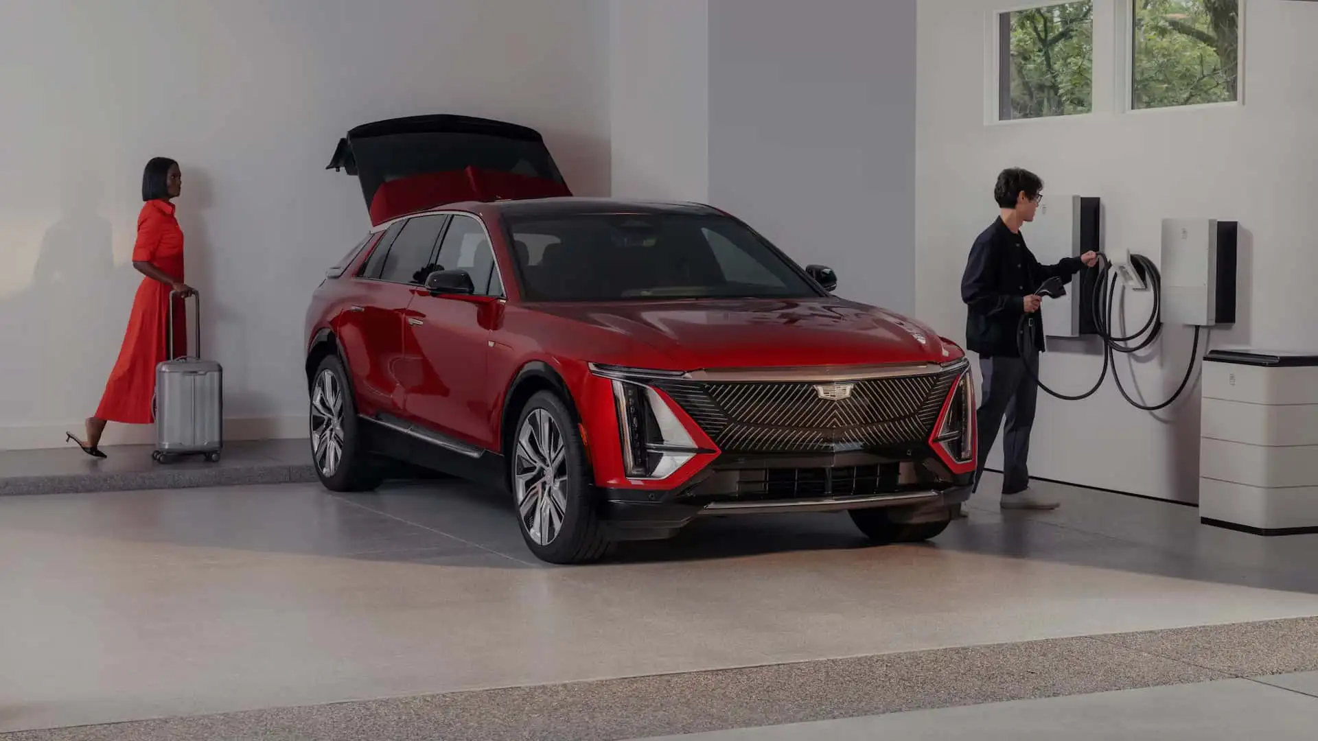 GM's vehicle-to-home technology integration in a home garage setting