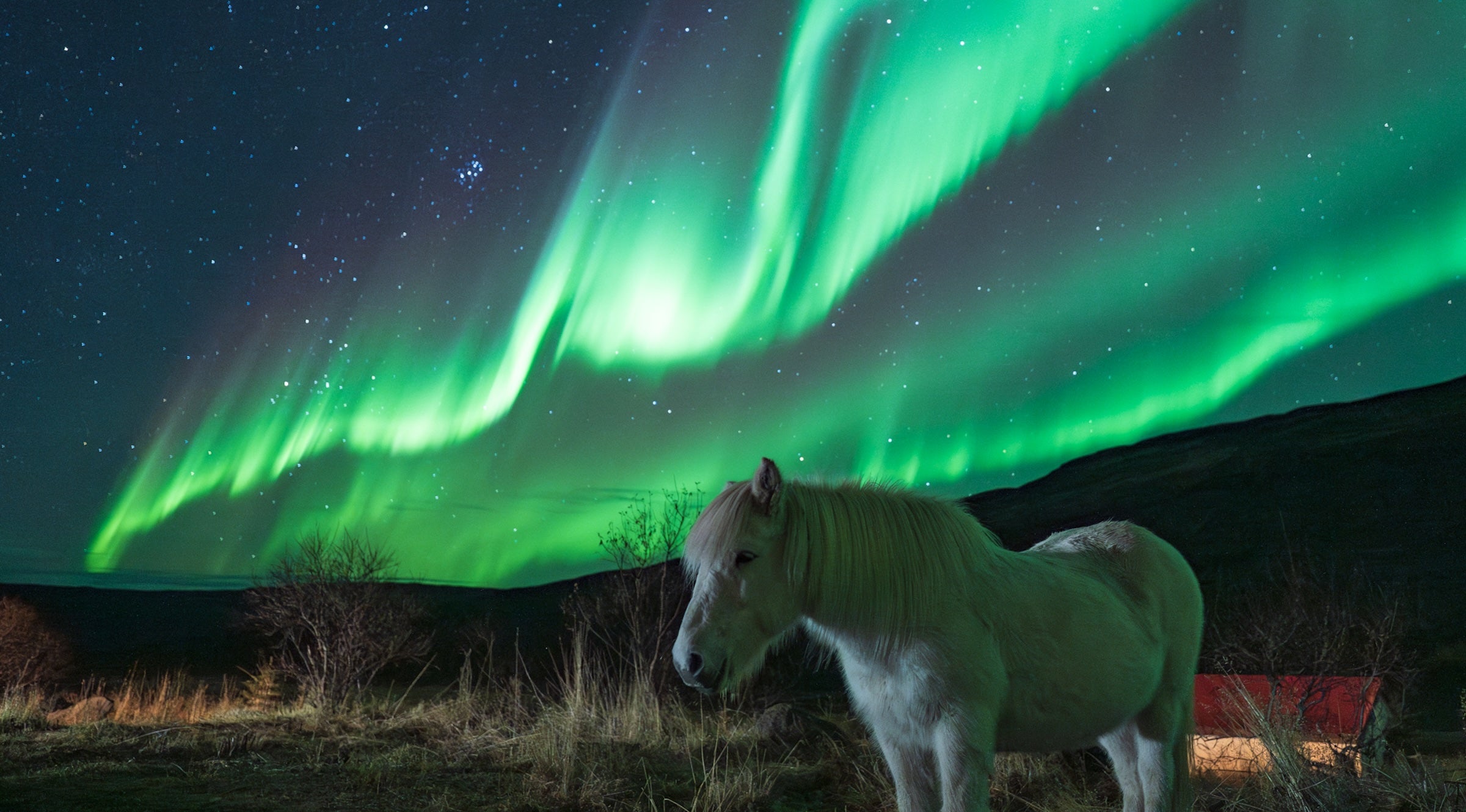 Aurora borealis over a landscape