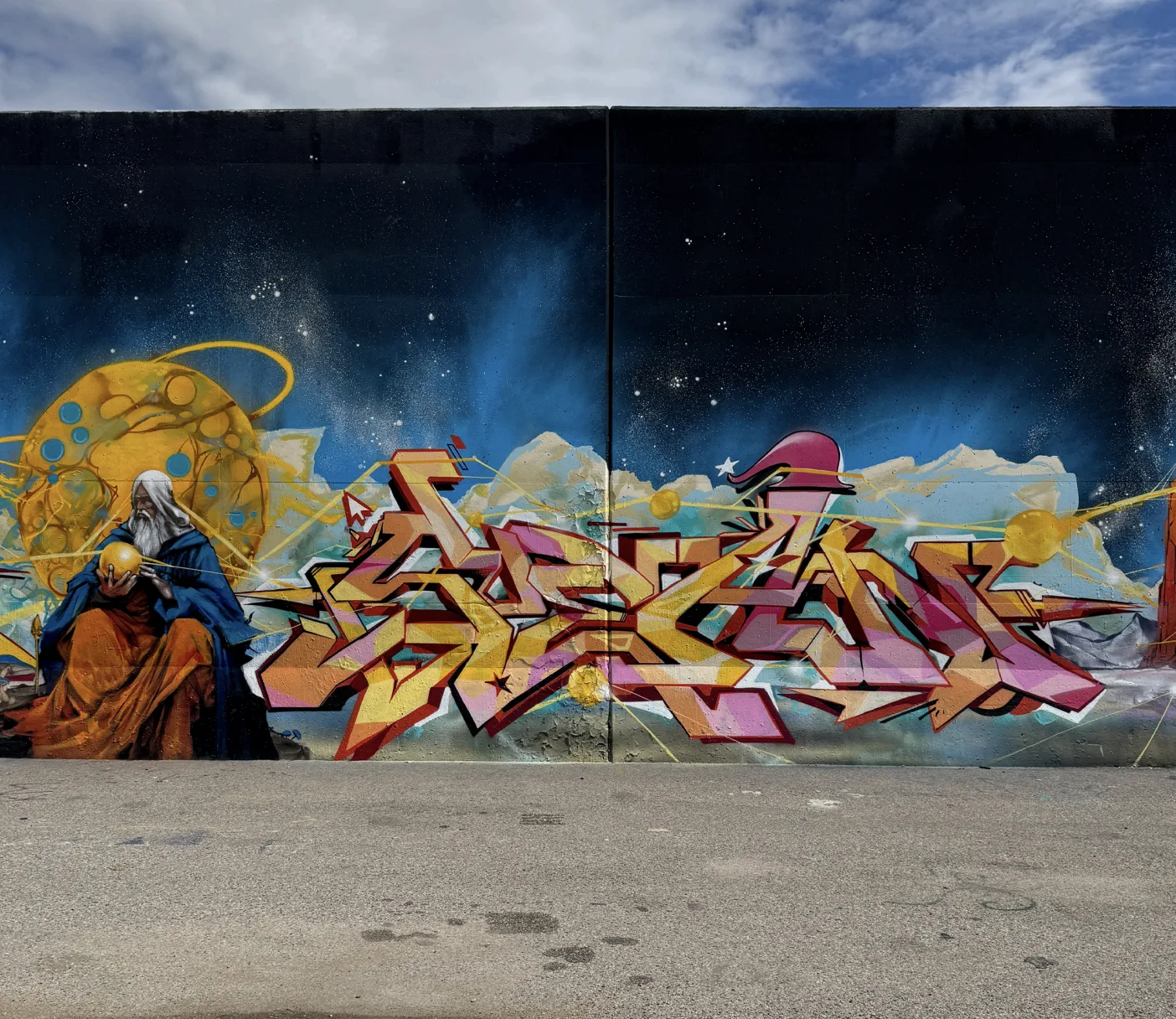 Paint Louis mural on the riverfront