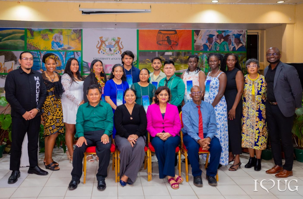 Celebration of Wapichan language graduates at University of Guyana, showing students and faculty at graduation ceremony.