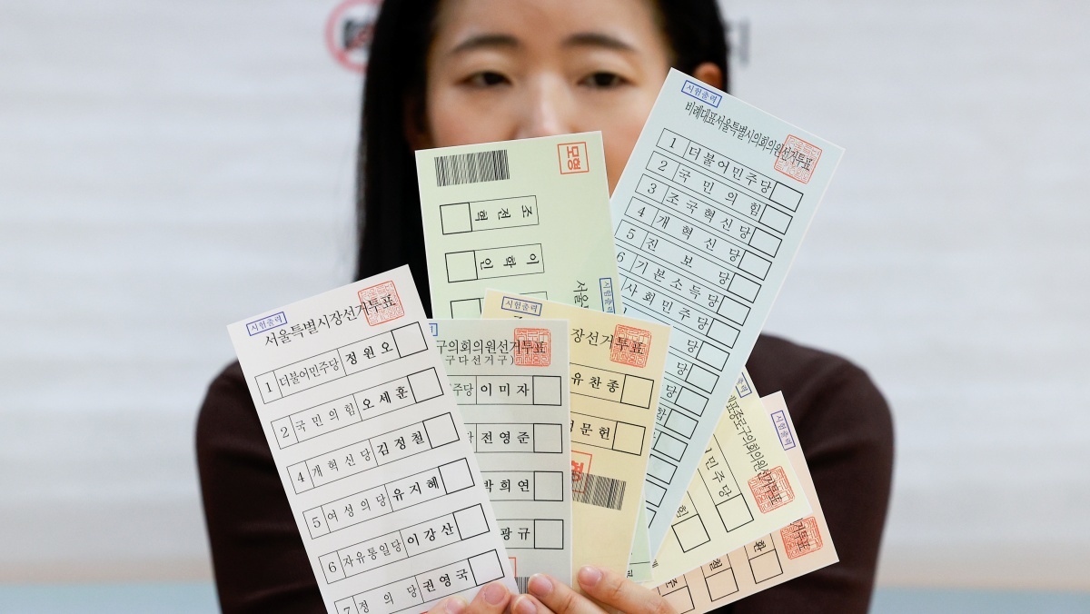 Voters casting ballots at an early voting station