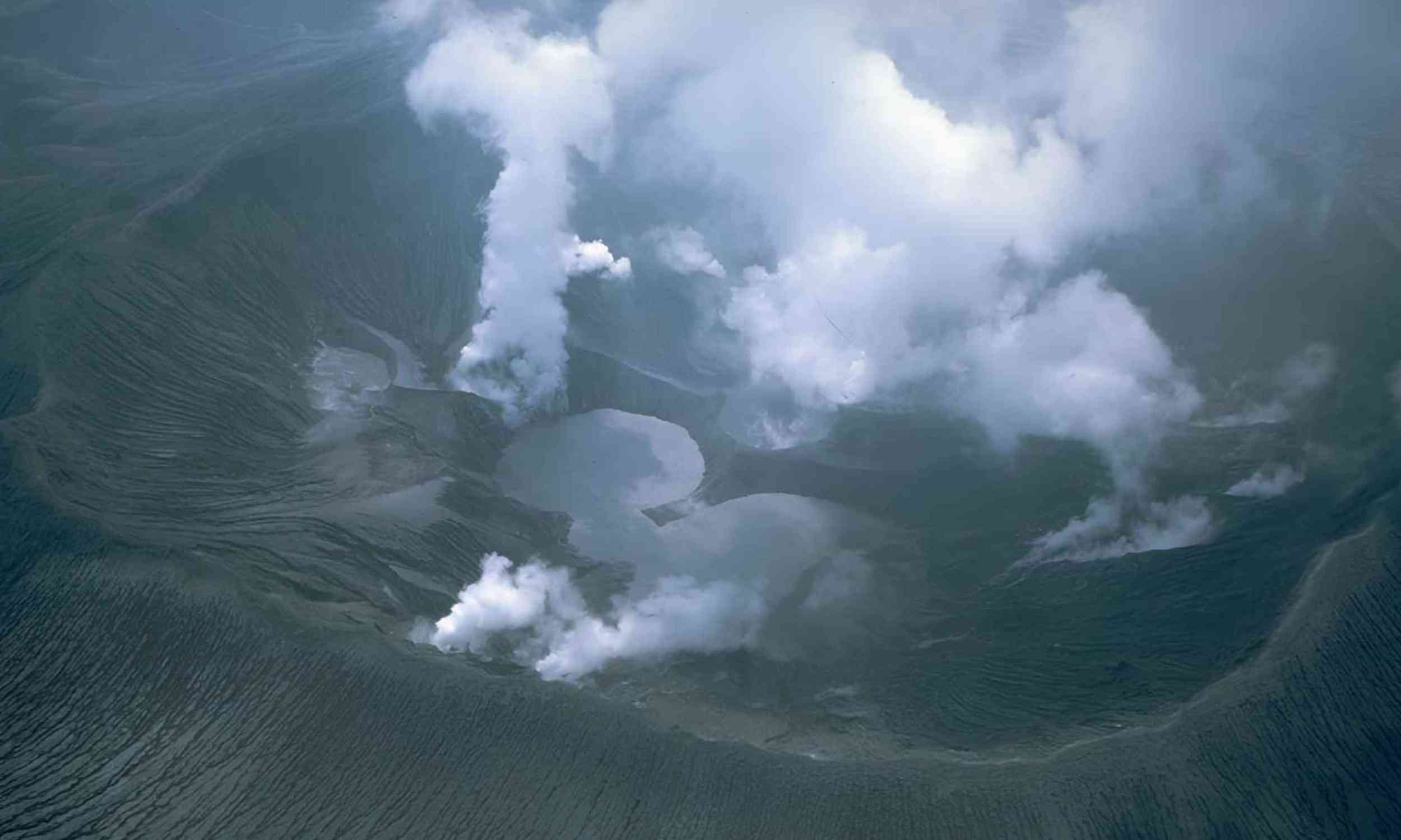 Volcanic landscape with seismic monitoring stations