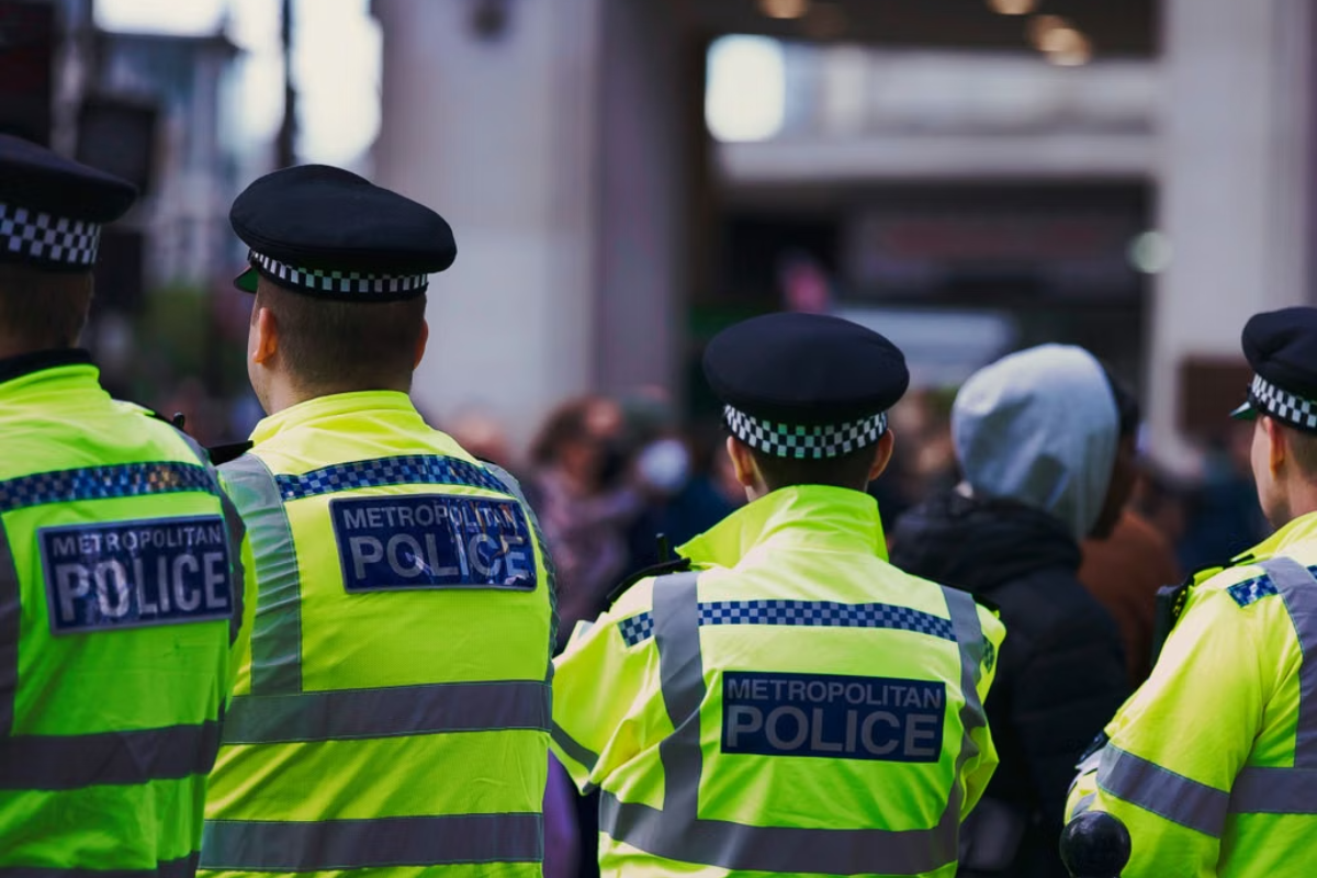 Illustration of facial recognition technology scanning crowds in London