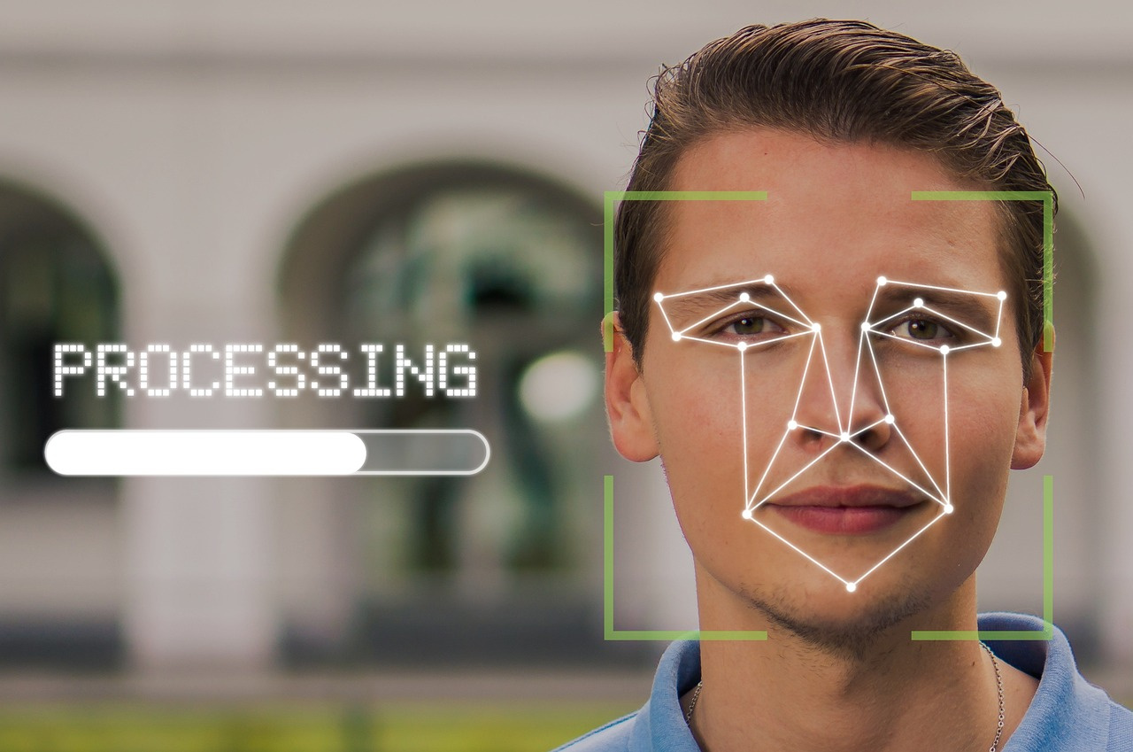 Facial recognition camera scanning a crowd
