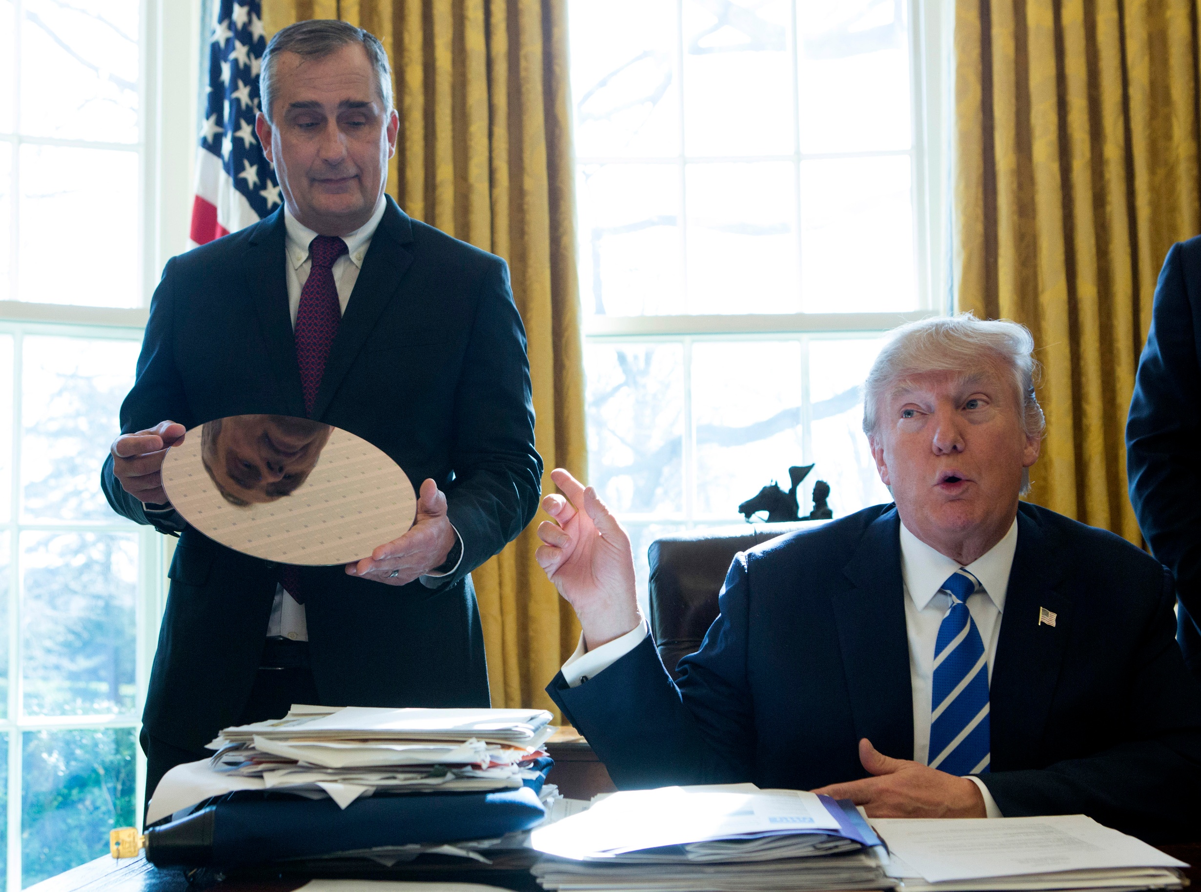 President Donald Trump speaks at a meeting with Intel CEO