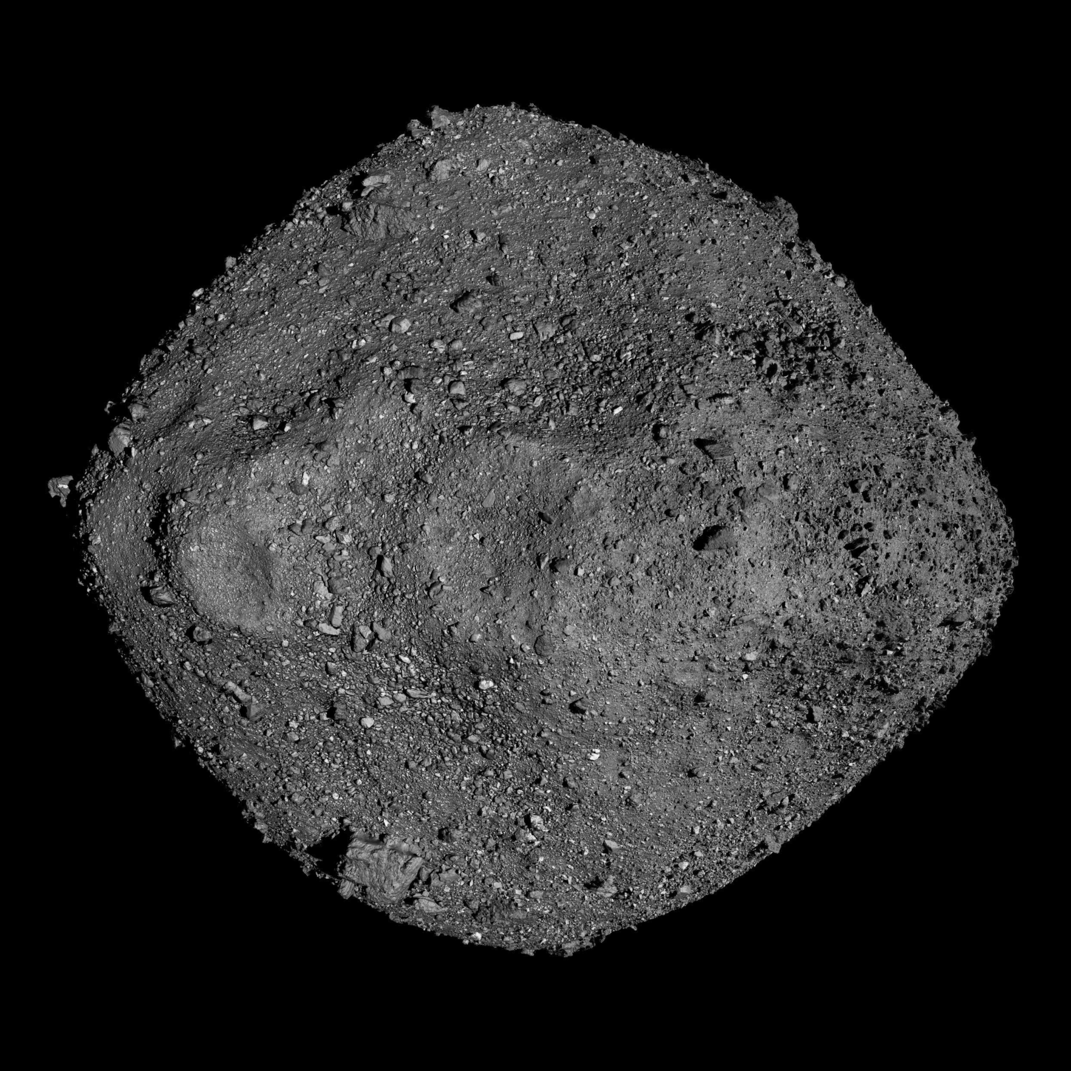 Microscopic view of isotopic grain analysis from asteroid Bennu showing presolar materials