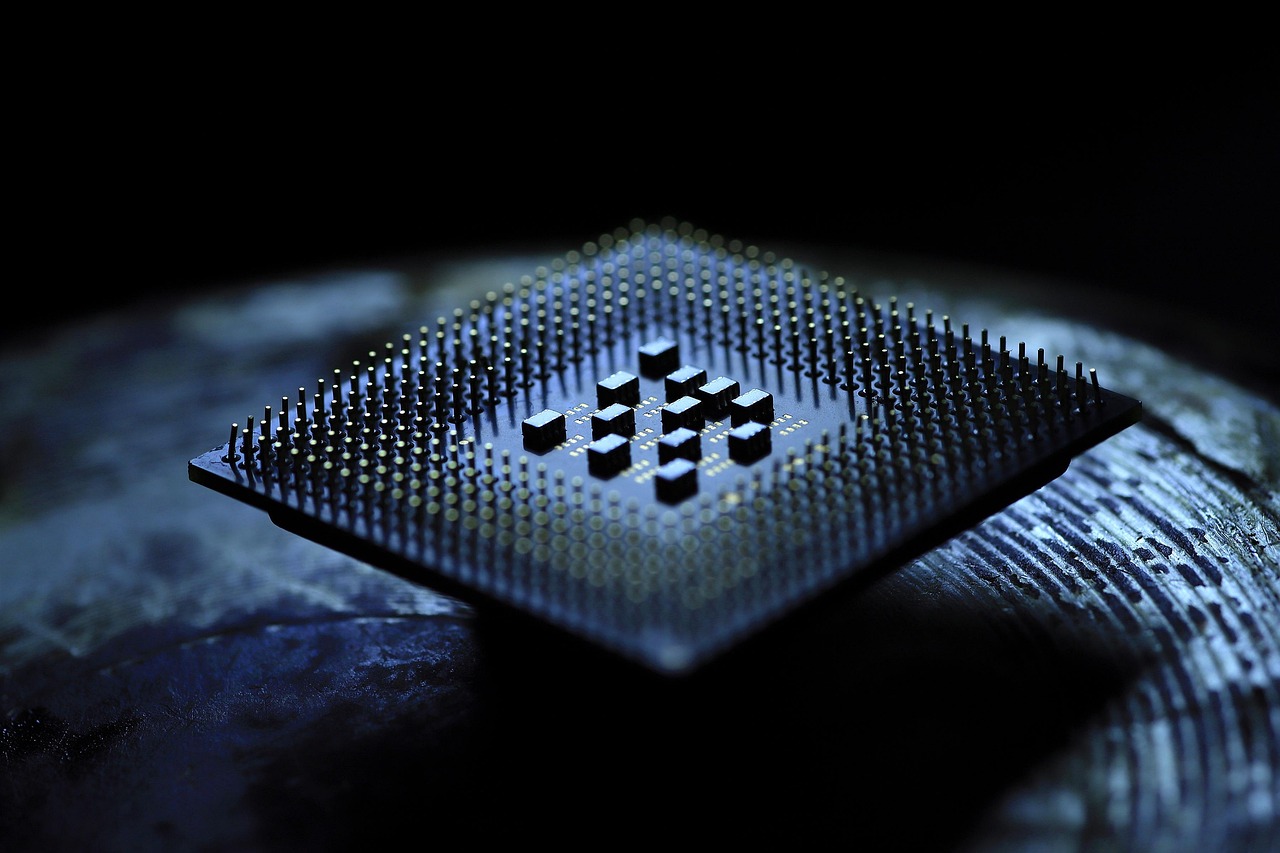 Microchip close-up illustrating FP4 hardware advancements