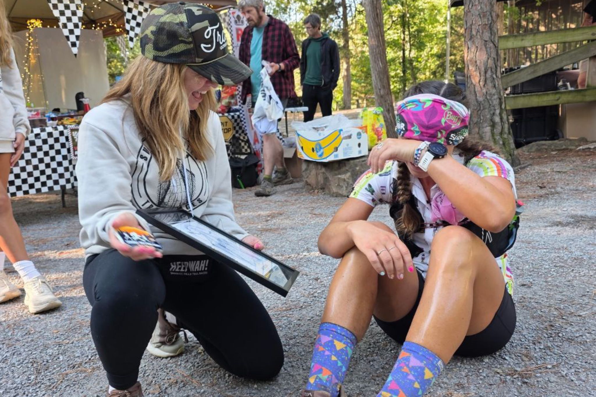 Runner crossing the finish line at the Shawnee National Forest ultra