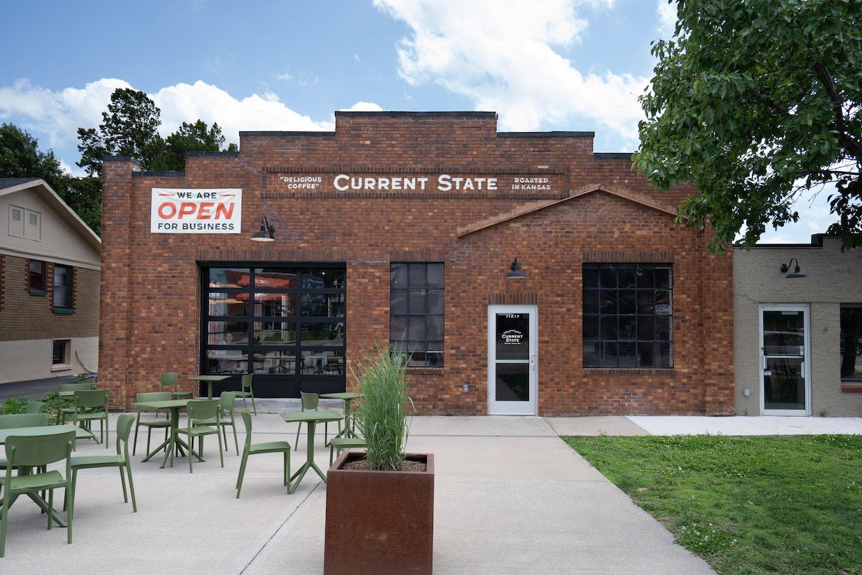Current State Coffee's new roastery cafe in Shawnee, Kansas features a historic red-brick building setting