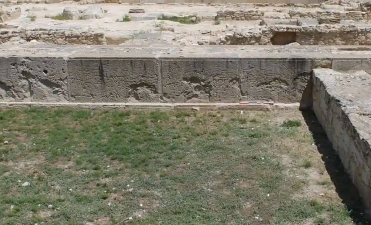 Temple wall in Cyprus with faint ship carvings