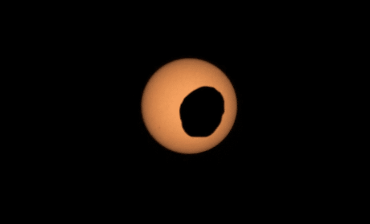 Perseverance rover view of Phobos crossing the Sun