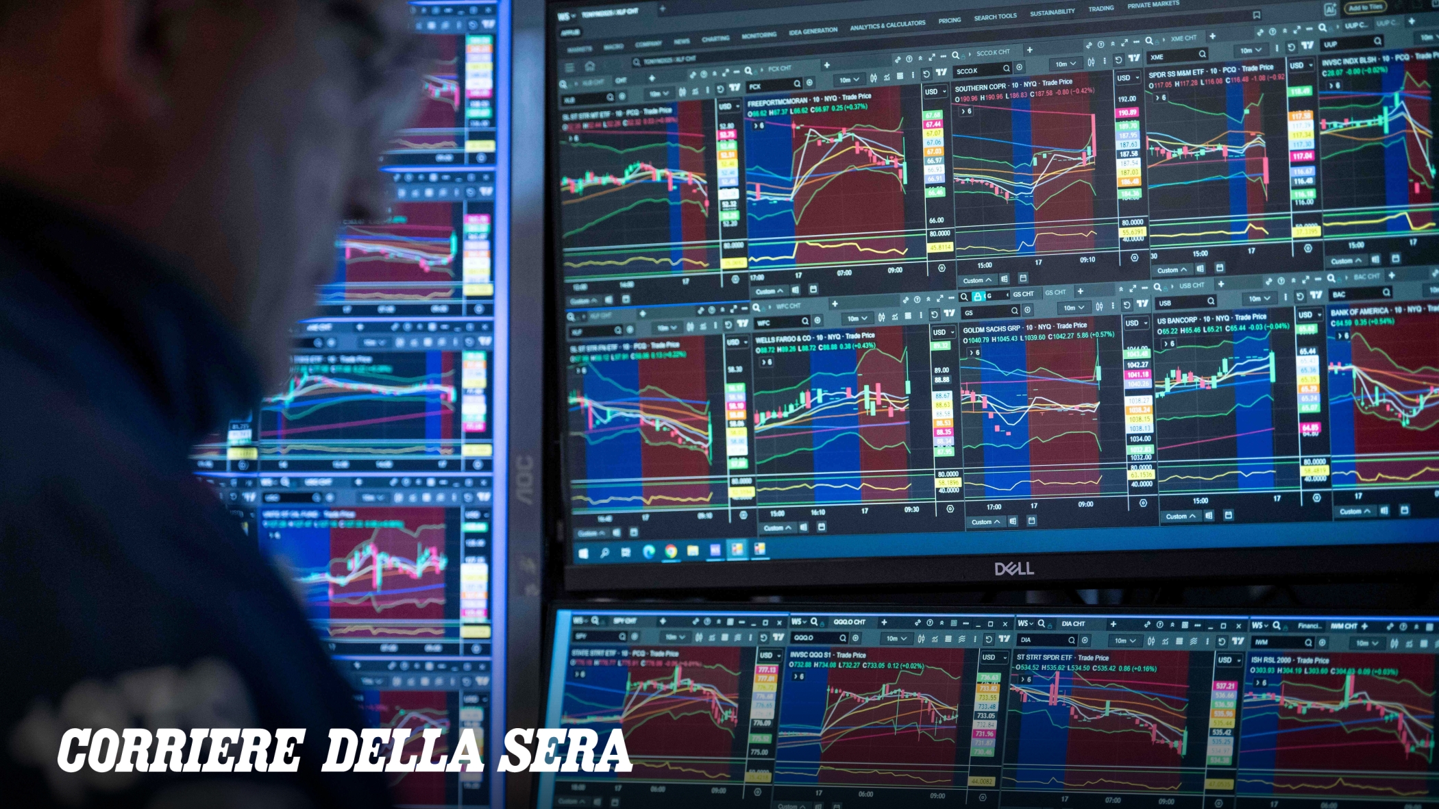 Milan Stock Exchange trading floor showing red screens