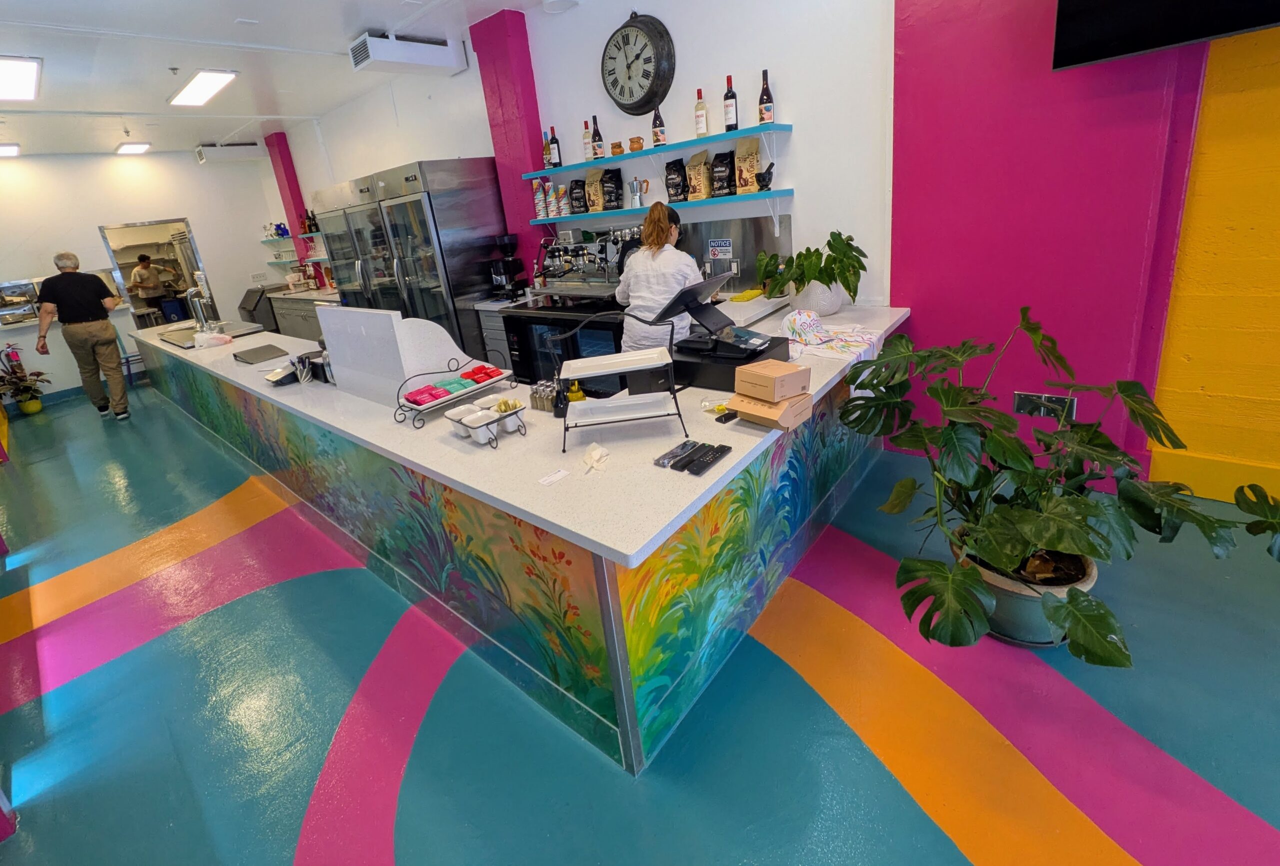Gelato Pazzo Café interior with colorful walls and dessert tubs