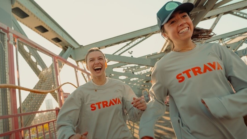 Strava runners using the app outdoors