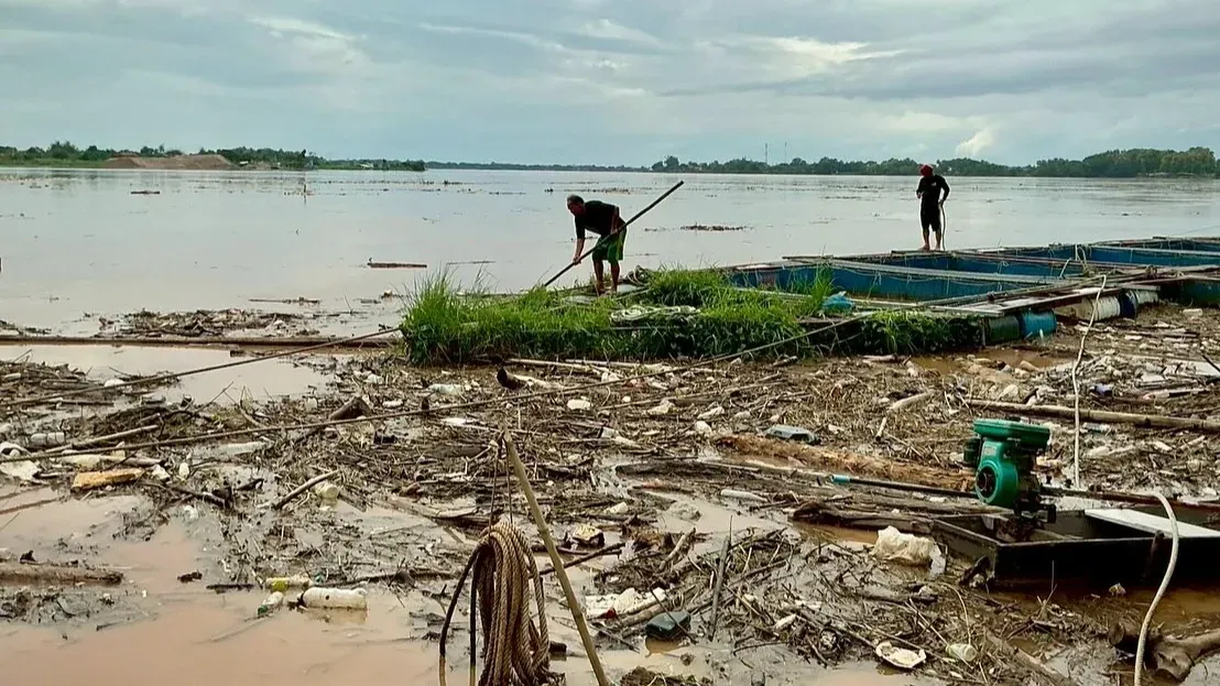 Mekong riverside community facing flooding and waste accumulation
