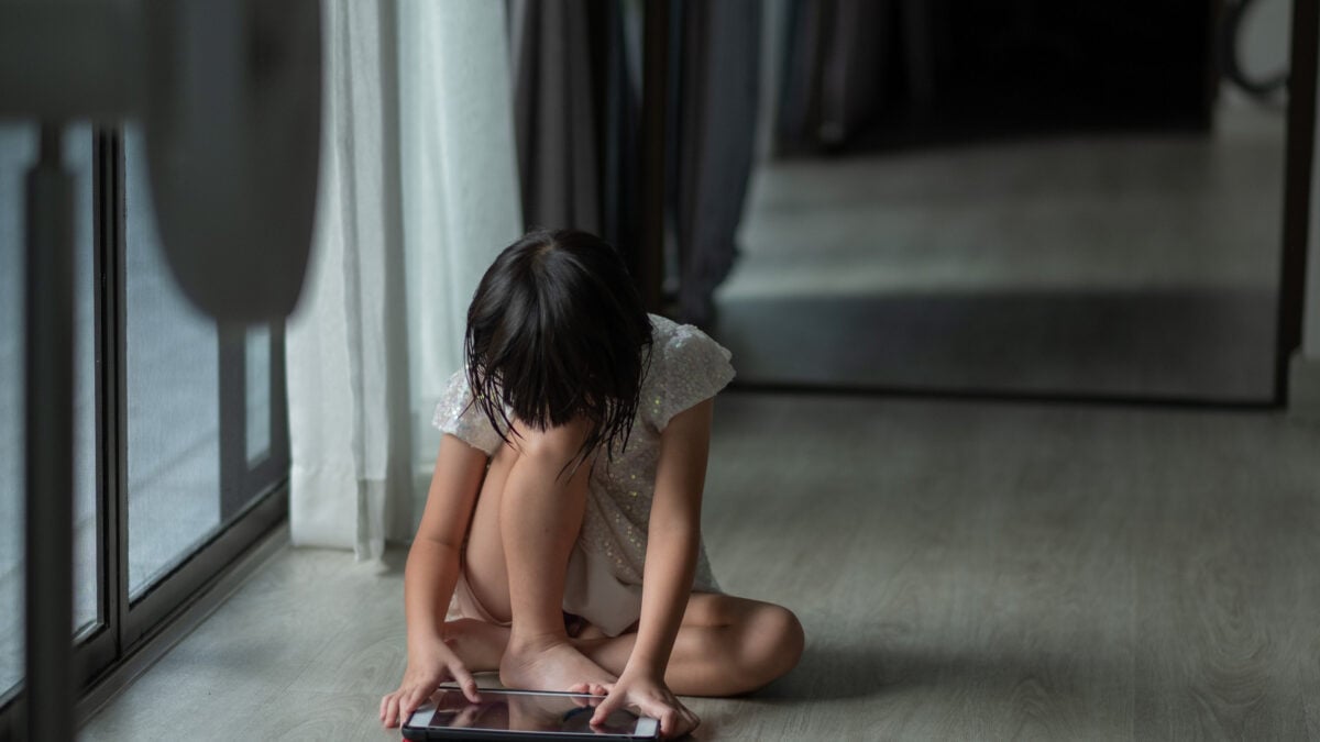 Child with tablet device