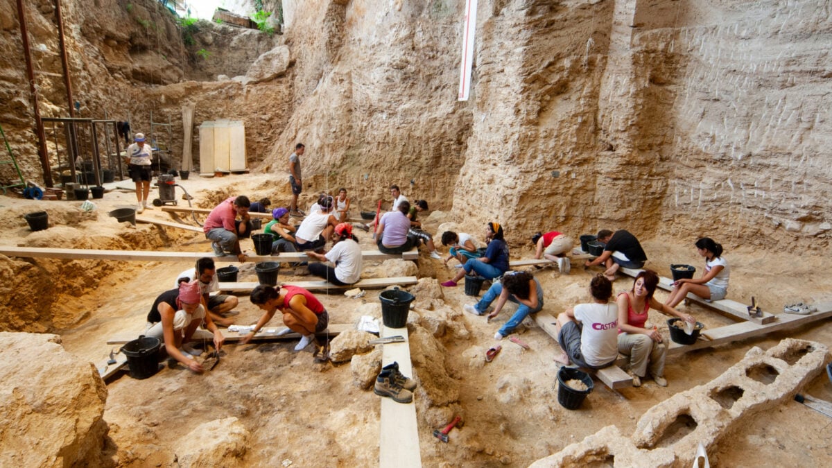Excavation site at Abric Romani showing preserved wooden artifacts