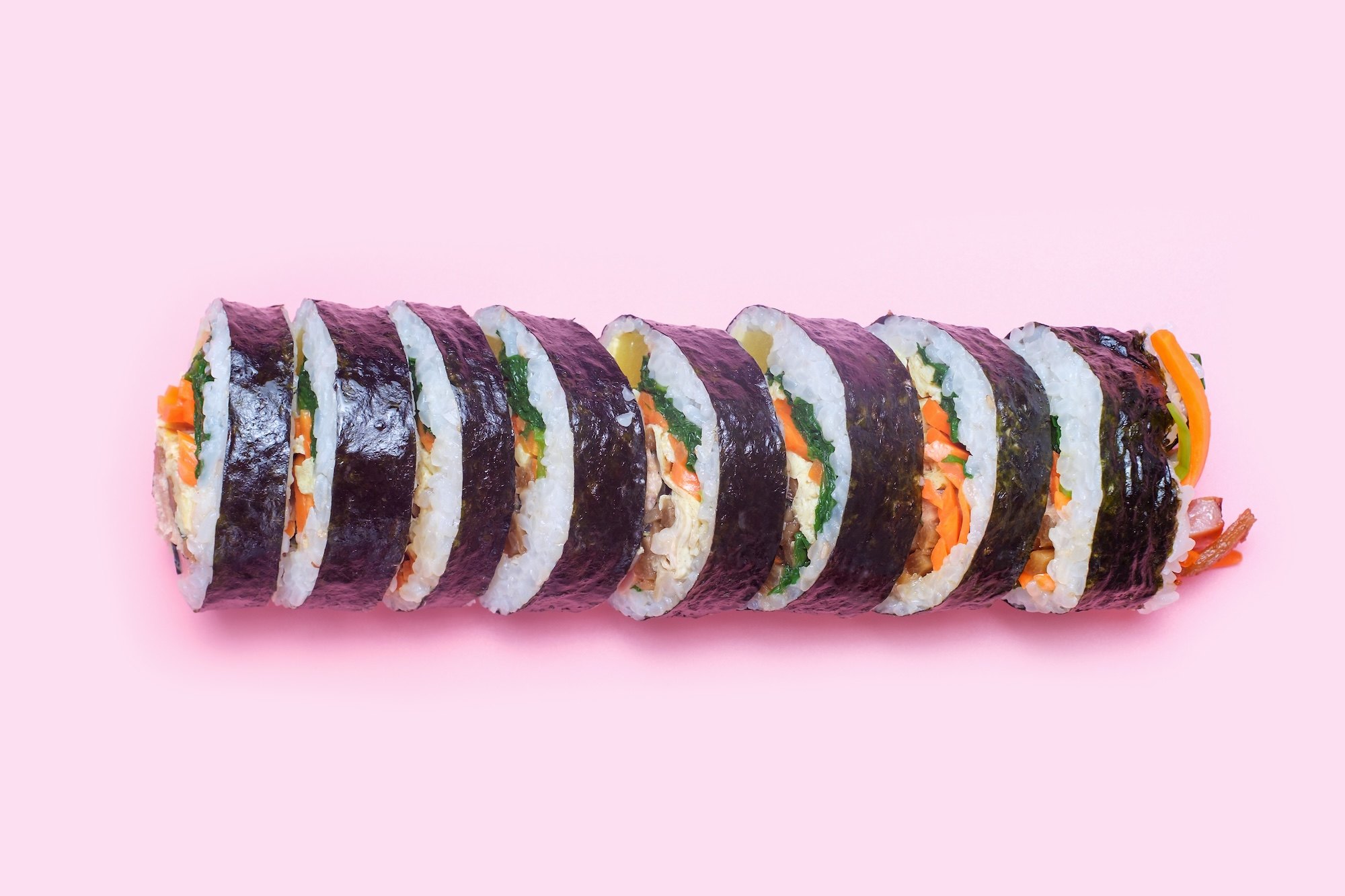 Korean street food favorites like kimbap and mandu are filling the freezer aisles at mainstream U.S. food retailers.