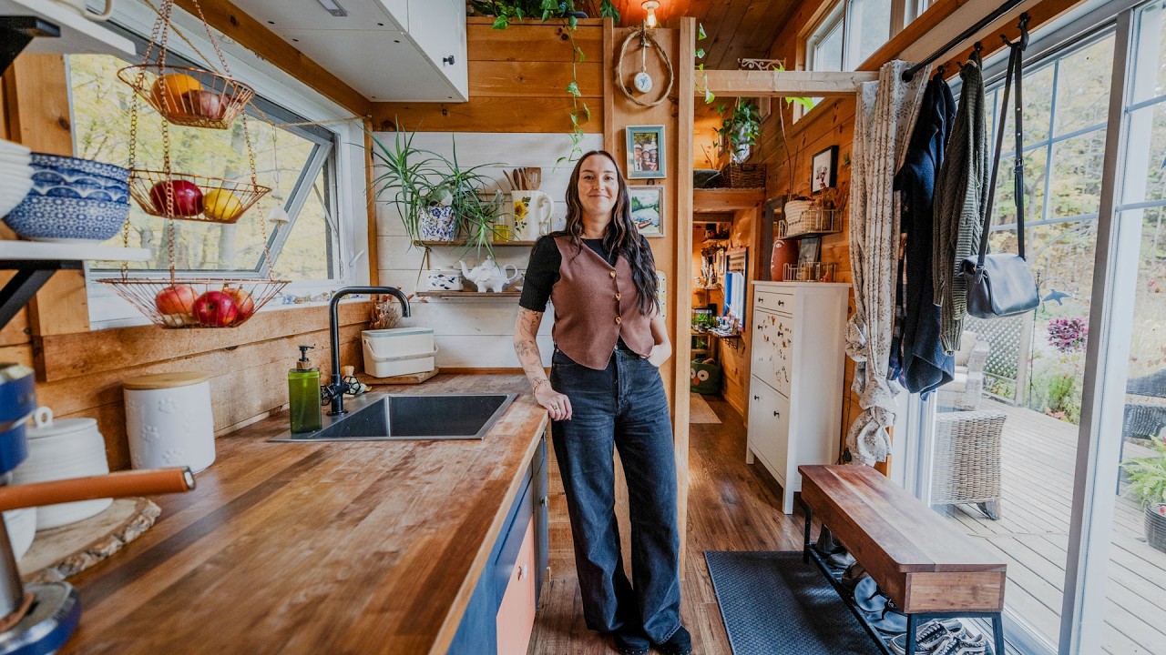 A completed tiny home exterior showcasing thoughtful design and integration with natural surroundings