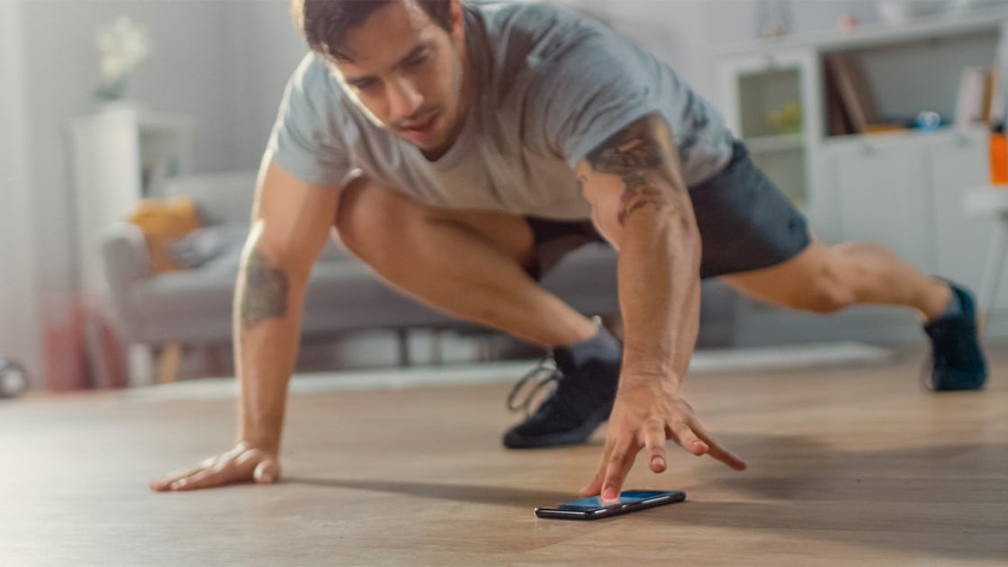Screenshot of a workout app interface with exercise tracking