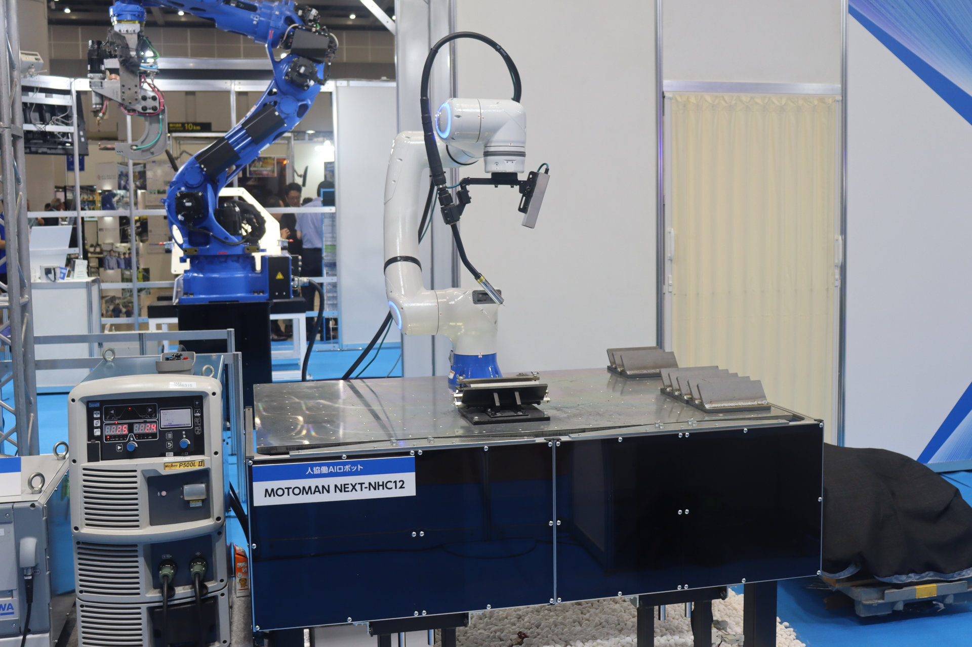 Yaskawa MOTOMAN NEXT AI robot performing camera-guided arc welding with expert sensory replication